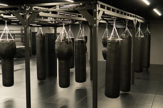 bag punching boxing background exercise, In the afternoon competition kick for punch from hobbie impact, red club. Martial activity dark,