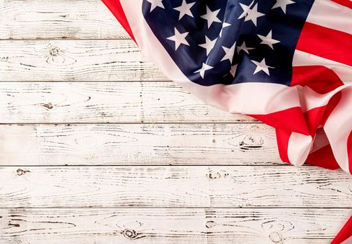 USA Memorial day, Presidents day, Veterans day, Labor day, or 4th of July celebration. USA national flag on white wooden background