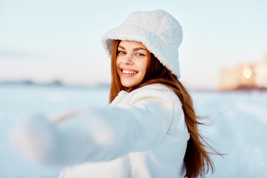 pretty woman smile Winter mood walk white coat Lifestyle. High quality photo