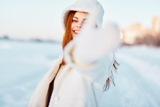 beautiful woman winter clothes walk snow cold vacation Fresh air. High quality photo