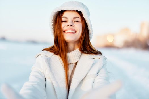 pretty woman smile Winter mood walk white coat Lifestyle. High quality photo