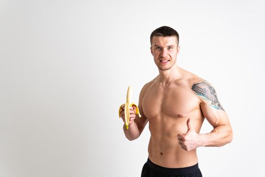 Man holds apples in fitness white background isolated isolated health, handsome sexy male lifestyle athlete, caucasian nude. Exercise energy nutrition, bodybuilder chest