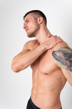 The muscles of the neck in a man on a white background are hurt back sore muscle, backache sick white massage adult, illness holding. Hold care, problem suffer attractive