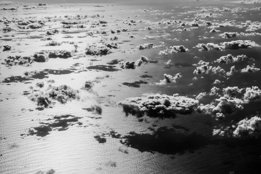 Beautiful clouds over the Atlantic ocean. Artistic black and white image