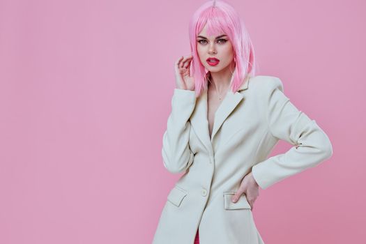 Portrait of a charming lady in White blazer pink hair Glamor Cosmetics color background unaltered. High quality photo