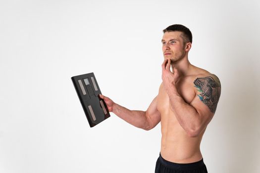 Man with weights health pondered, health and sports on a white background ache body painful, person isolated massage stress, muscular chronic. lumbar therapy, back suffer attractive