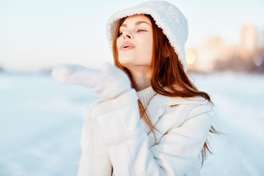 young woman smile Winter mood walk white coat Lifestyle. High quality photo