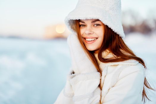 woman red hair snow field winter clothes Lifestyle. High quality photo