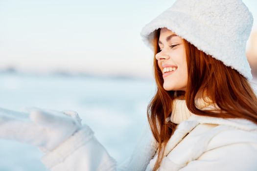 young woman smile Winter mood walk white coat Lifestyle. High quality photo