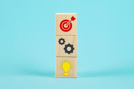 Concept of business strategy and action plan. Cube stacking with icon. Concept of business strategy and action plan. Cube stacking with icon