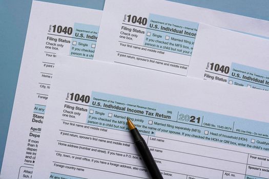 Tax forms 1040. U.S Individual Income Tax Return on a desk. Business and tax concept.