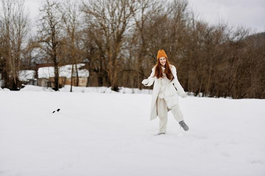 Happy young woman snowy weather walk fresh air winter holidays. High quality photo