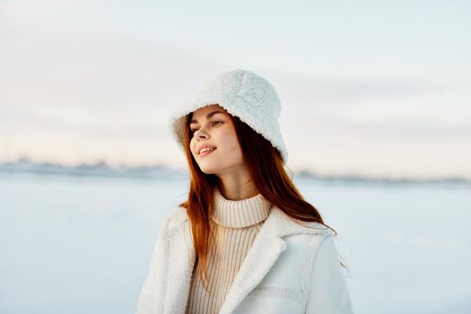 beautiful woman winter weather snow posing nature rest nature. High quality photo