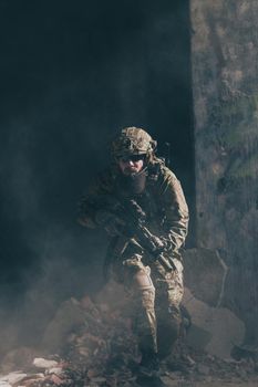 A bearded soldier in the uniform of special forces in dangerous military action in a dangerous enemy area. Selective focus. High-quality photo