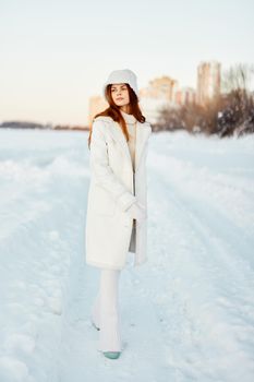 woman winter clothes walk snow cold vacation Lifestyle. High quality photo