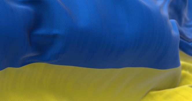 Detail of the national flag of Ukraine waving in the wind. Democracy and politics. Patriotism. Selective focus. Seamless Slow motion