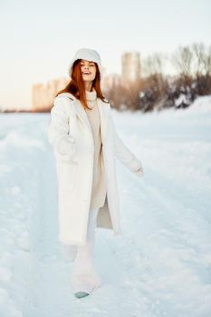 pretty woman winter weather snow posing nature rest Lifestyle. High quality photo
