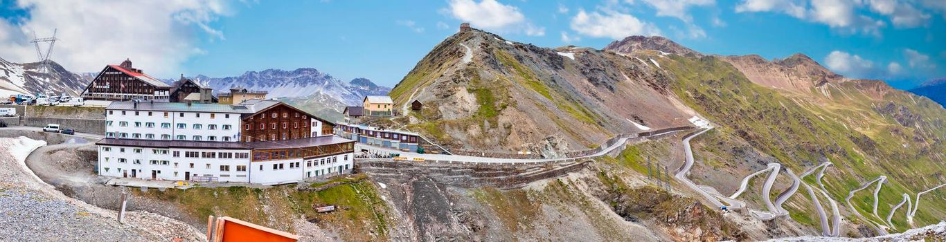 Stelvio mountain pass or Stilfser Joch scenic road serpentines panoramic view, border of Italy and Switzerland