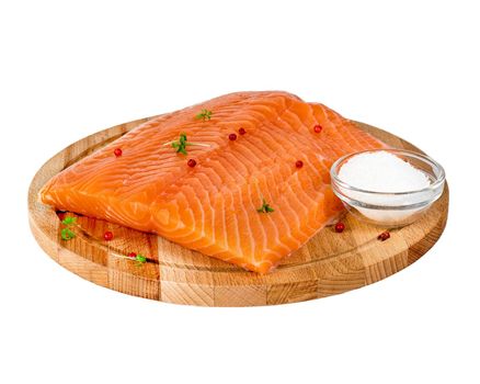 Fresh salmon fillet on wooden cutting board on white background, side view