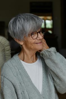 Portrait of a 75 years old gray-haired woman