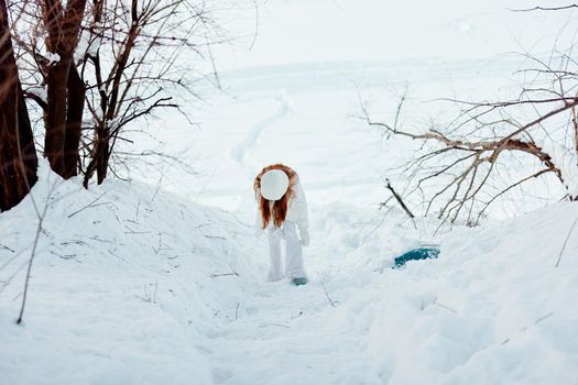 beautiful woman winter weather snow posing nature rest travel. High quality photo