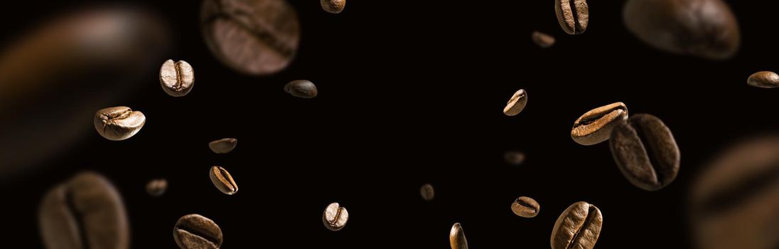 Coffee beans in flight on a dark background.