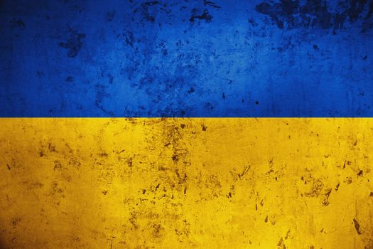 Grungy and damaged wall painted with blue and yellow paint like Ukrainian flag