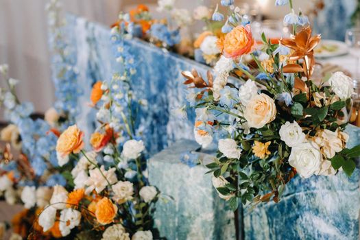 Decorated Table for a wedding reception in a restaurant .Wedding decor.