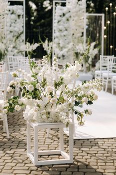 A place for a wedding ceremony on the street. Decorated wedding venue.