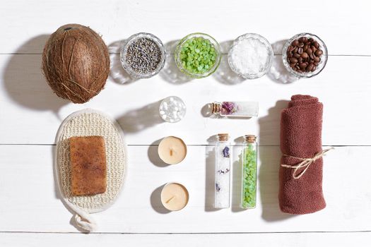 Composition of spa treatment on white wooden table with space for text. Top view. Still life. Flat lay