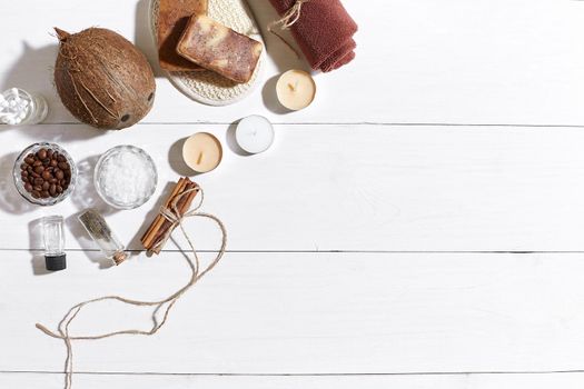 Composition of spa treatment on white wooden table with space for text. Top view. Still life. Flat lay