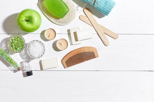 Composition of spa treatment on white wooden table with space for text. Top view. Still life. Flat lay