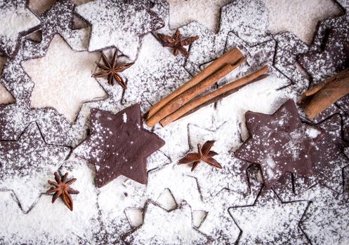 Cutting gingerbread cookies. Falling star concept. Christmas. Process of baking cookies at home..