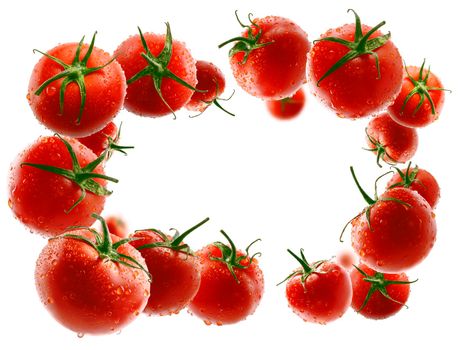 Red tomatoes levitate on a white background.