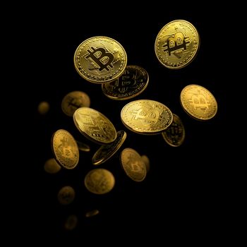 Gold coin Bitcoin levitates on a black background.