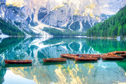 Photographic view of the famous and characteristic the Braies lake in the Italian Dolomites mountain range 