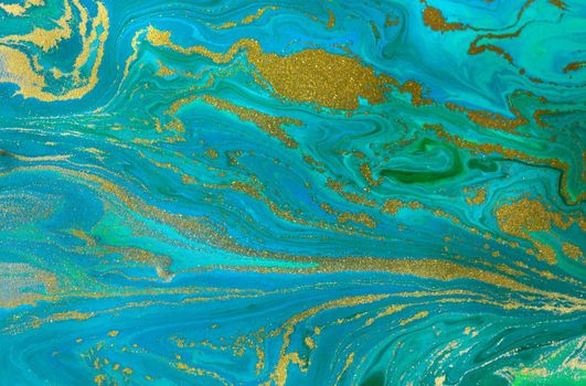 Gold waves on flow blue paints background. Abstract print.