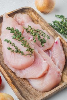 Raw fillet of chicken fillet, on white background