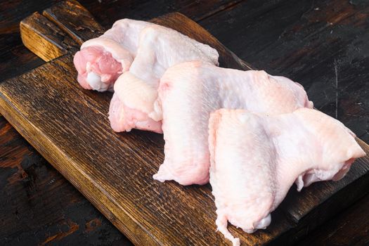 Raw meat. Chicken wings set, on wooden cutting board
