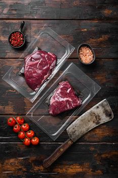 Beef rump steak pack set, on old dark wooden table background, top view flat lay