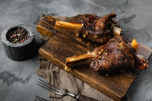 Slow Cooked Lamb Shanks meat set, on gray stone table background