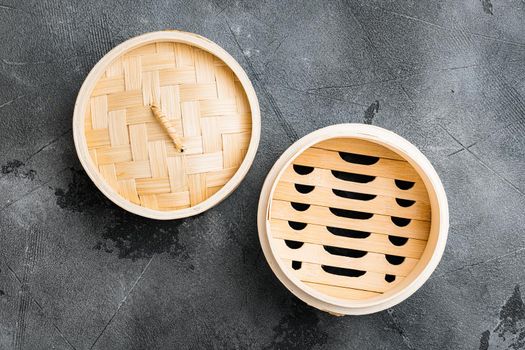 Empty Bamboo Steamer set, with copy space for text or food, with copy space for text or food, top view flat lay, on gray stone table background