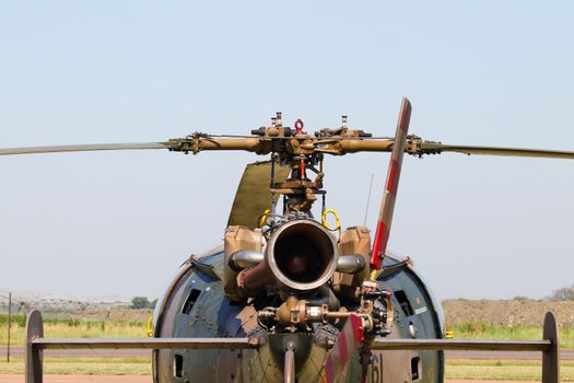 Military Alouette III helicopter with engine and rotor head abstract rear view, South Africa
