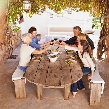 A group of people preparing to enjoy lunch together.