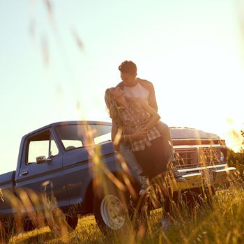 Shot of an affectionate young couple on a roadtrip.