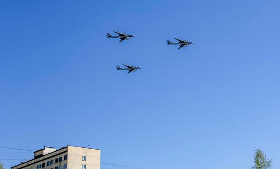 Russian planes fly to the military parade on Victory Day.