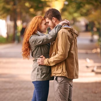 Shot of a happy young couple getting lost in each others presence.