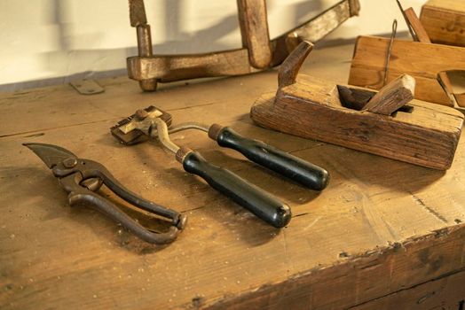 Detail shot of historical metal tools in a table