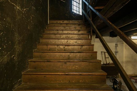 Detail shot of Old wooden staircase in a historic building