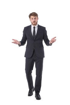 Handsome young man wearing elegant business suit clueless and confused with open arms, no idea concept full length studio portrait isolated on white background
